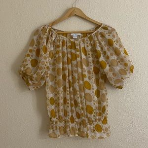 Sheer, polka dot top.